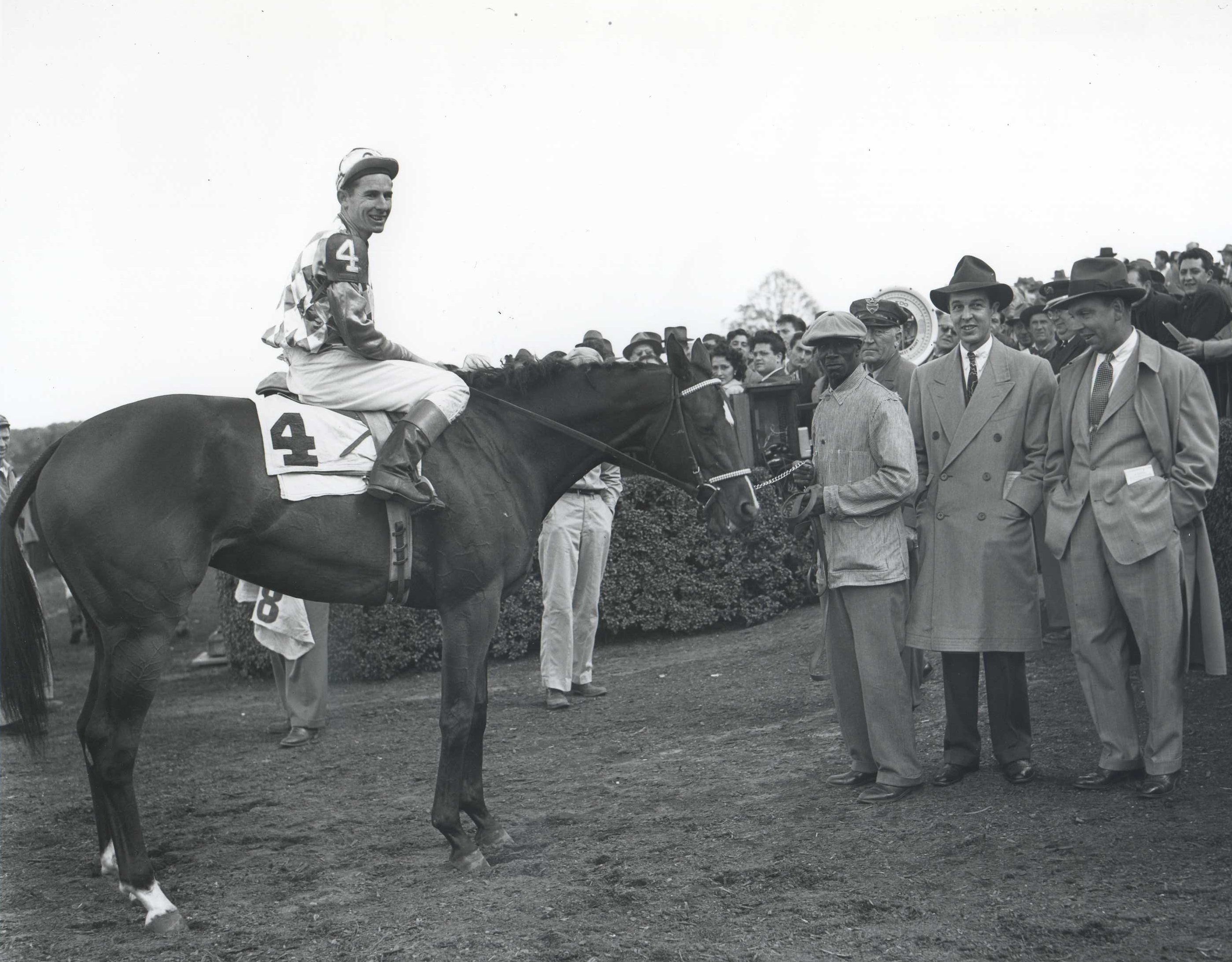 Bed o' Roses (Eric Guerin up) in the winner's circle for the 1949 Matron at Belmont Park (Keeneland Library Morgan Collection/Museum Collection)
