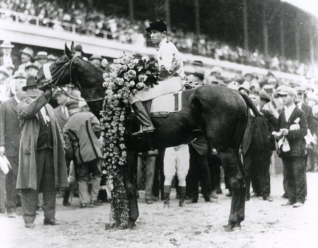 Black Gold (Jimmy Mooney up) in the winner's circle for the 1924 Kentucky Derby (Churchill Downs Inc./Kinetic Corp. /Museum Collection)