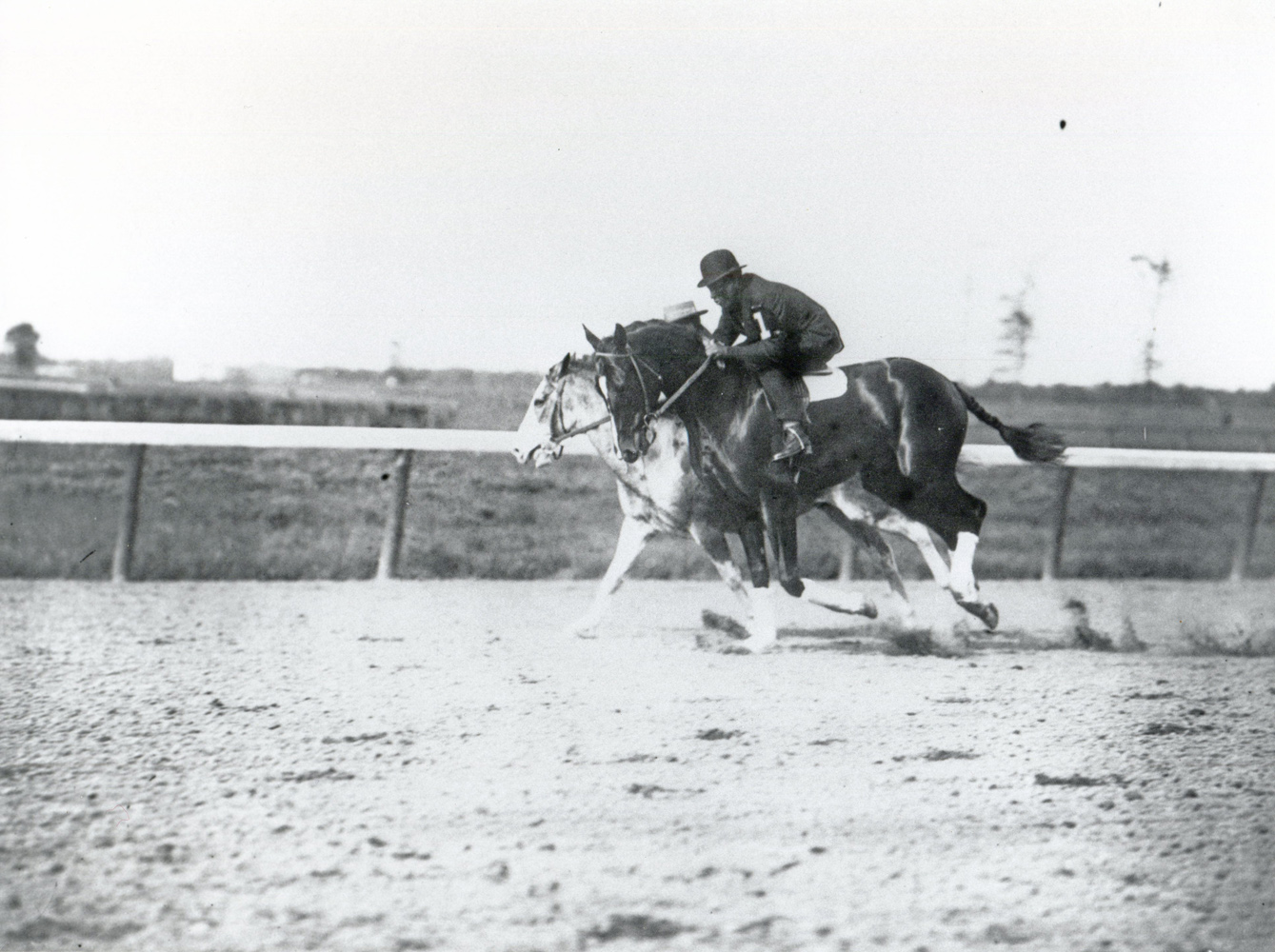 Colin warming up on the track with Marshall Lilly up (Keeneland Library Cook Collection/Museum Collection)