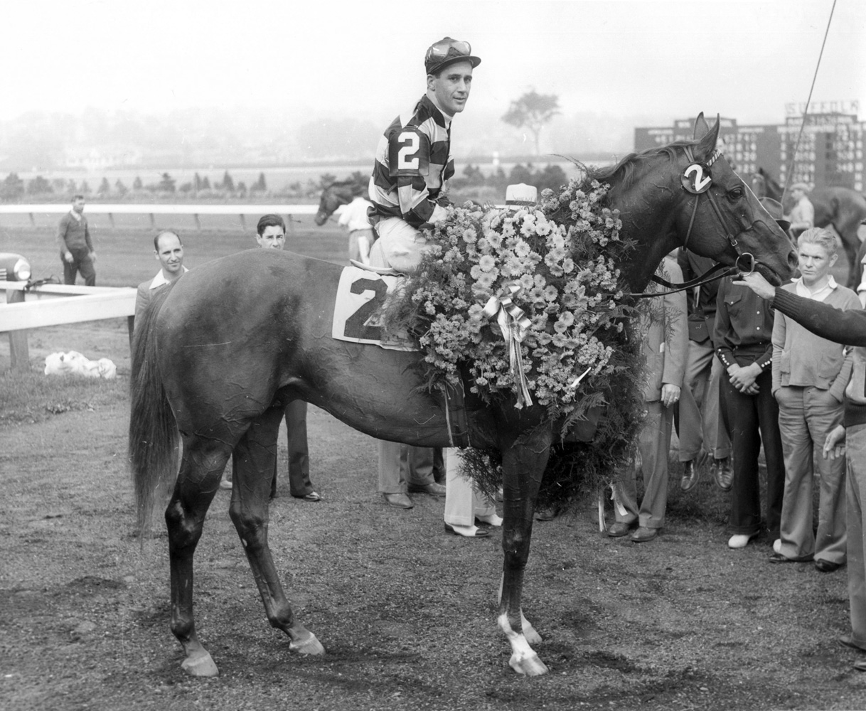 Eight Thirty (Harry Richards up) in the winner's circle for the 1940 Massachusetts Handicap at Suffolk Downs (Museum Collection)