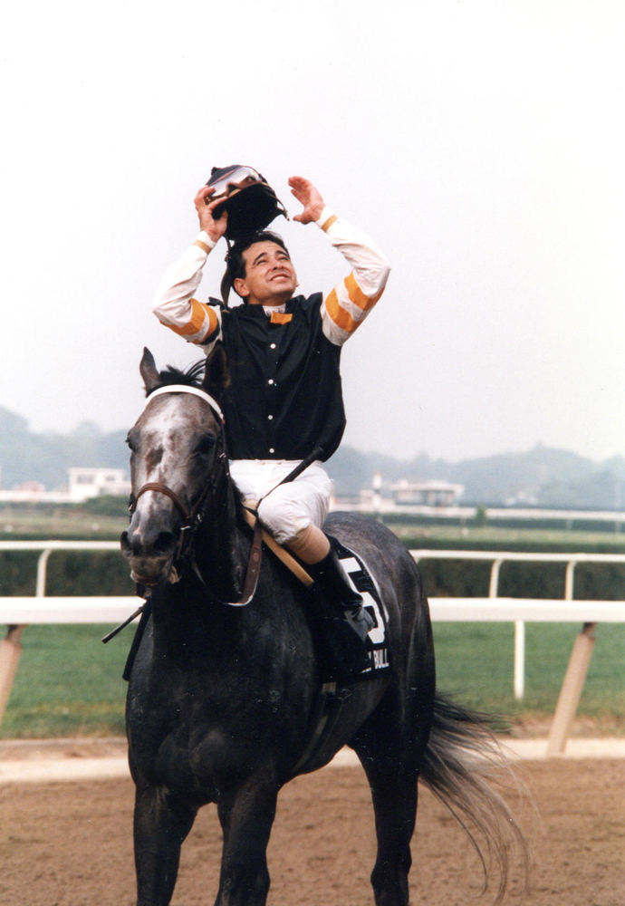 Holy Bull with Mike Smith up celebrating after winning the 1994 Woodward at Belmont Park (Barbara Ann Giove Coletta/Museum Collection)