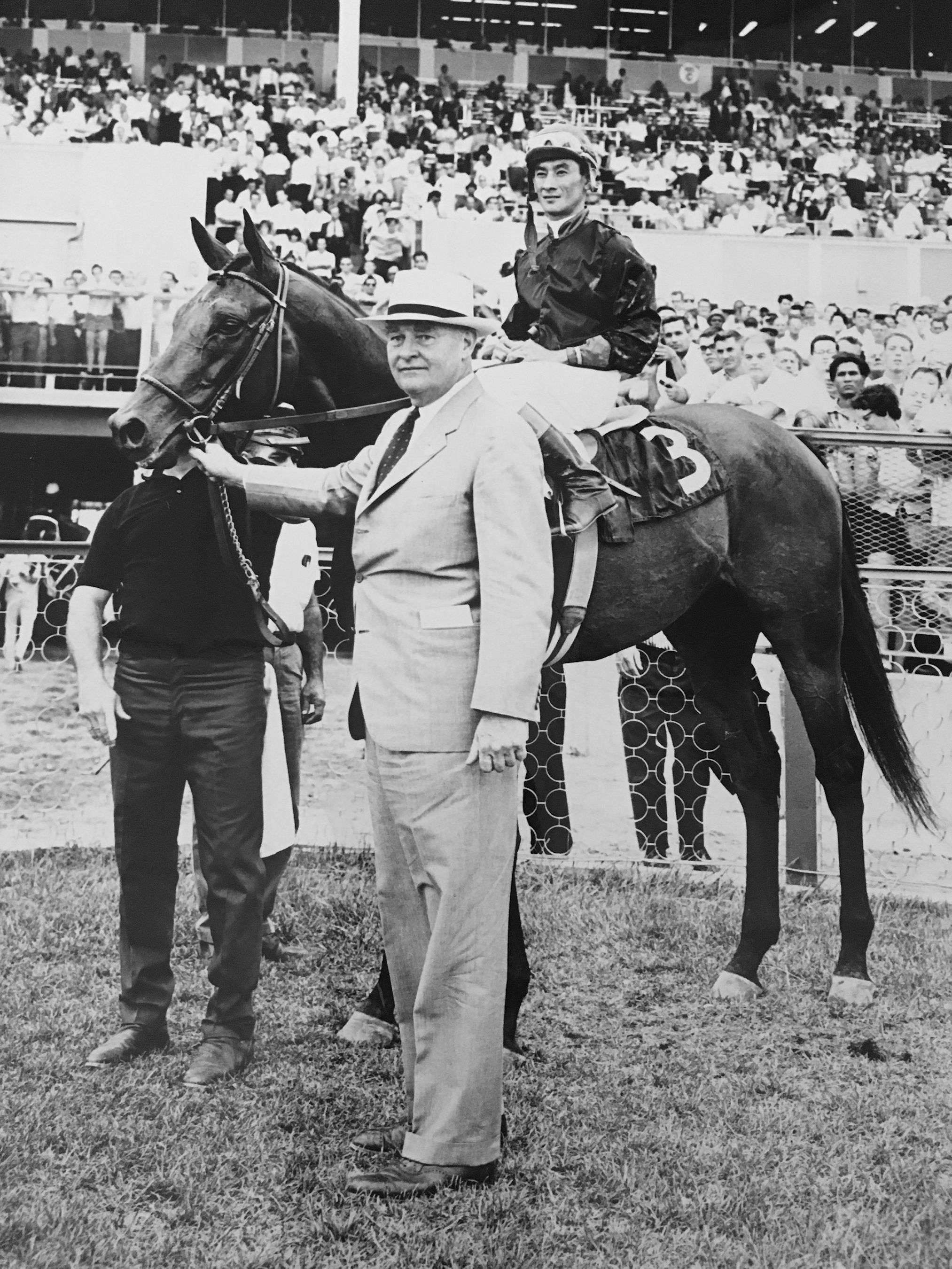 Buckpasser (Braulio Baeza up) and Ogden Phipps (Keeneland Library Thoroughbred Times Collection)
