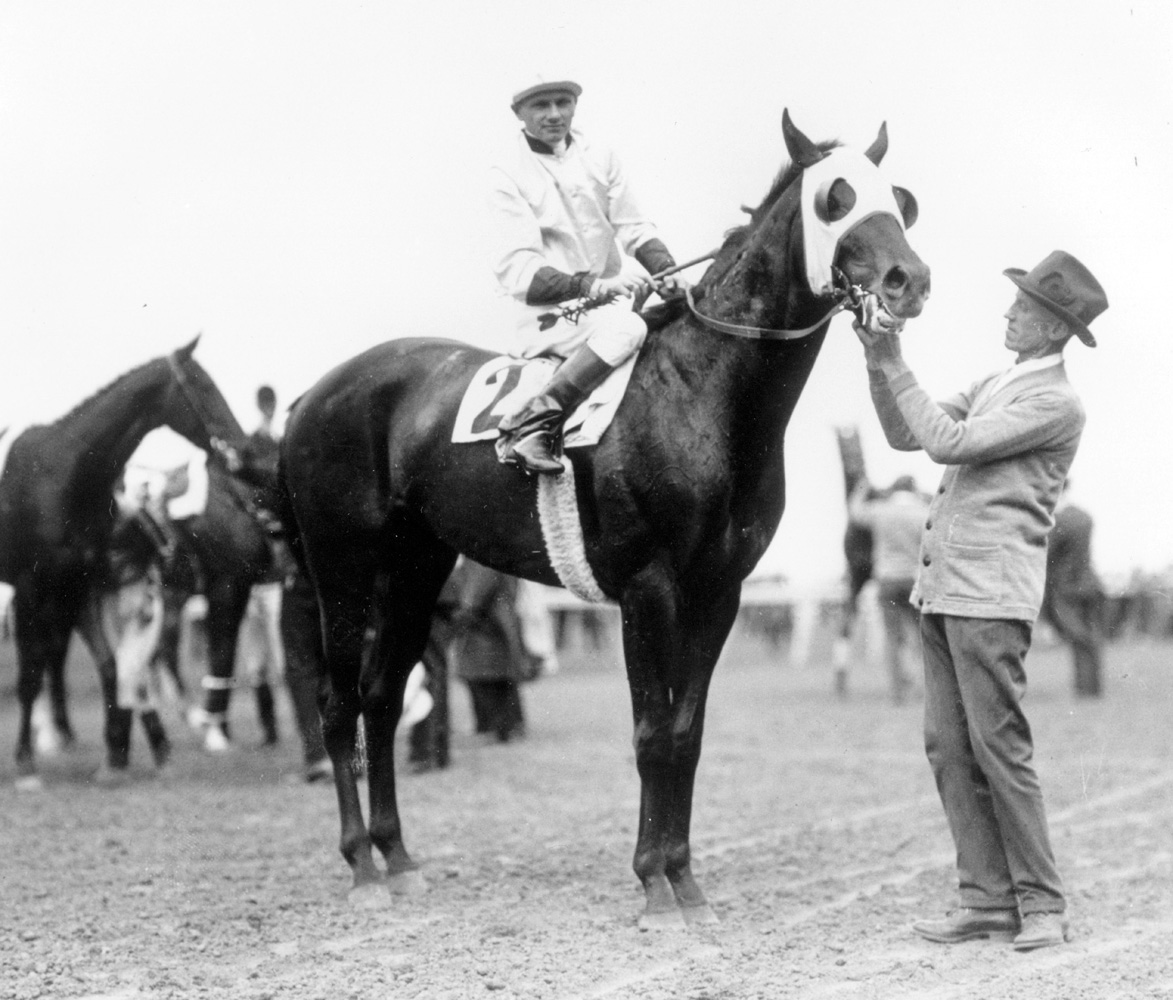 Zev (Earl Sande up) after winning the 1923 Belmont Stakes with trainer Sam Hildreth (Keeneland Library Cook Collection/Museum Collection)