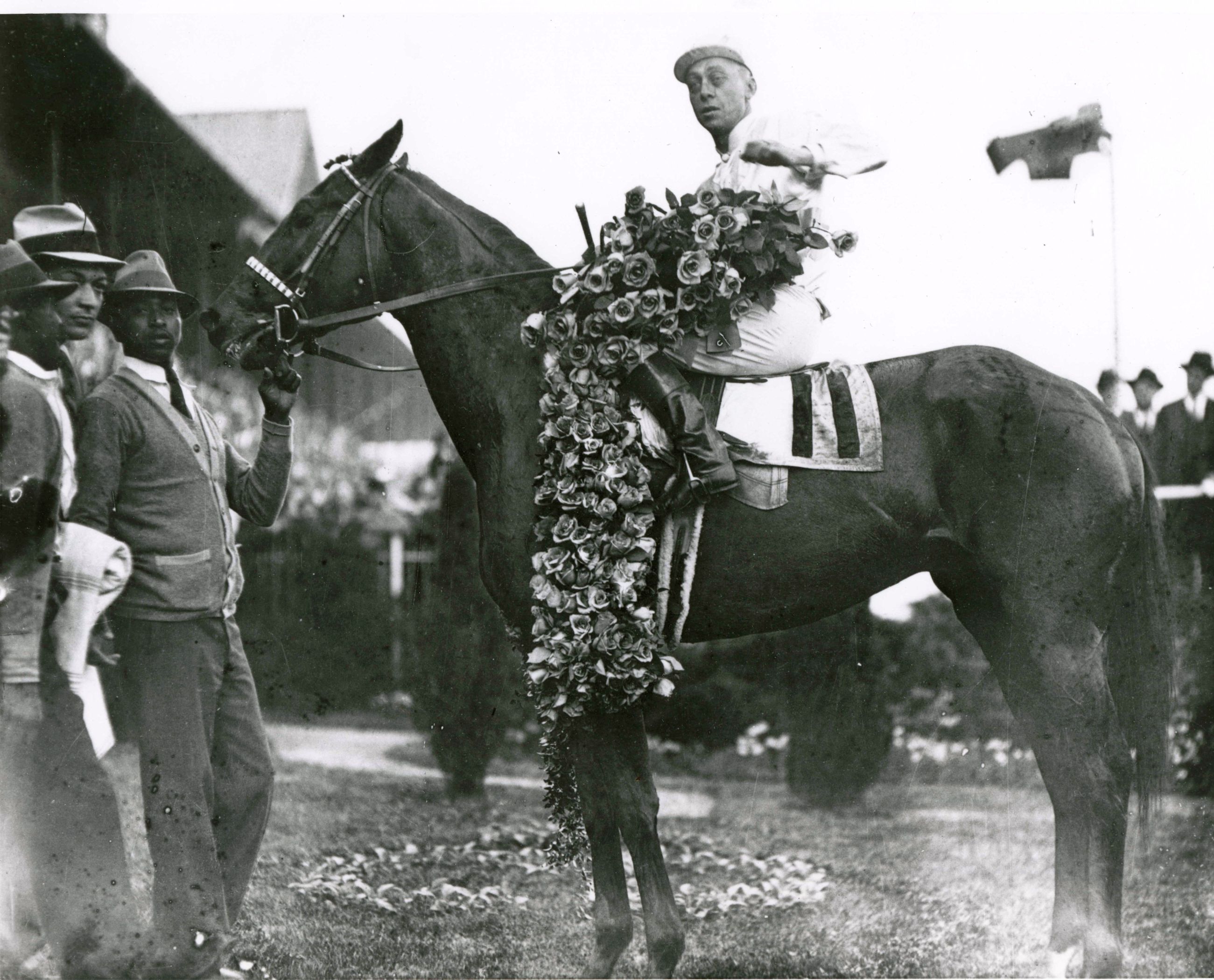 Cavalcade (Mack Garner up) in the winner's circle for the 1934 Kentucky Derby (Churchill Downs Inc./Kinetic Corp. /Museum Collection)