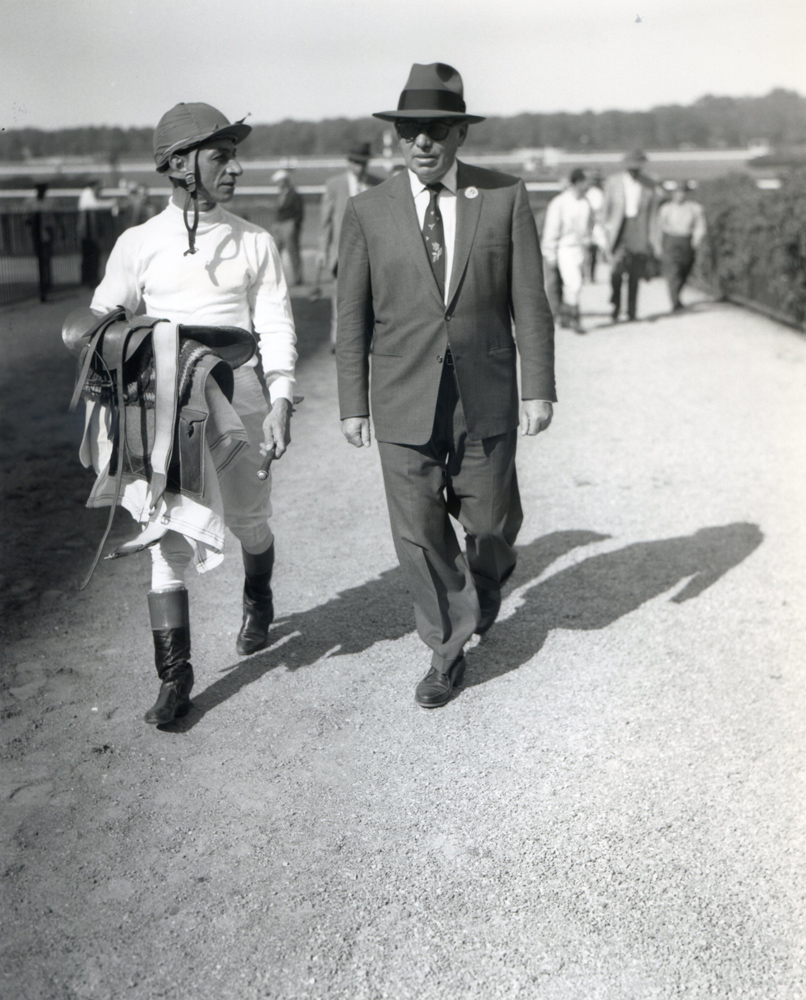 Eddie Arcaro and trainer William Molter at Belmont Park, 1958 (Keeneland Library Morgan Collection/Museum Collection)