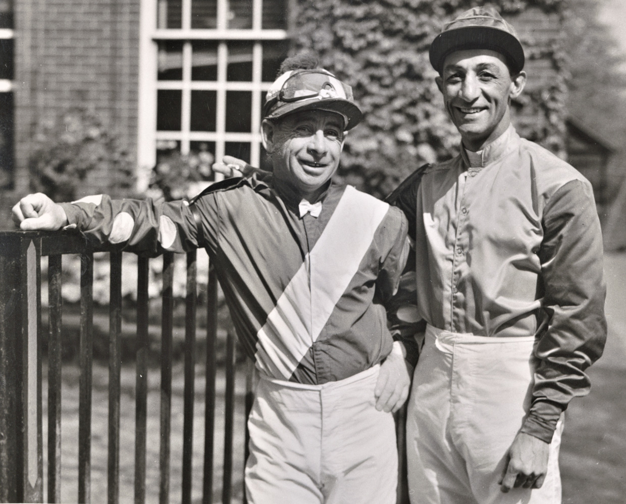 Johnny Longden and Eddie Arcaro in 1955 (Keeneland Library Morgan Collection)