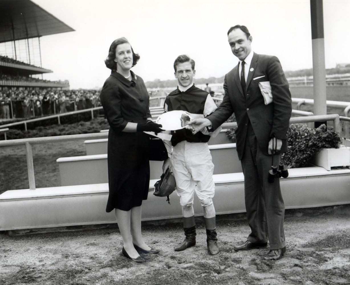 Trophy presentation for the 1961 Juvenile Stakes at Aqueduct, won by Bobby Ussery and Sunrise County (Keeneland Library Morgan Collection/Museum Collection)