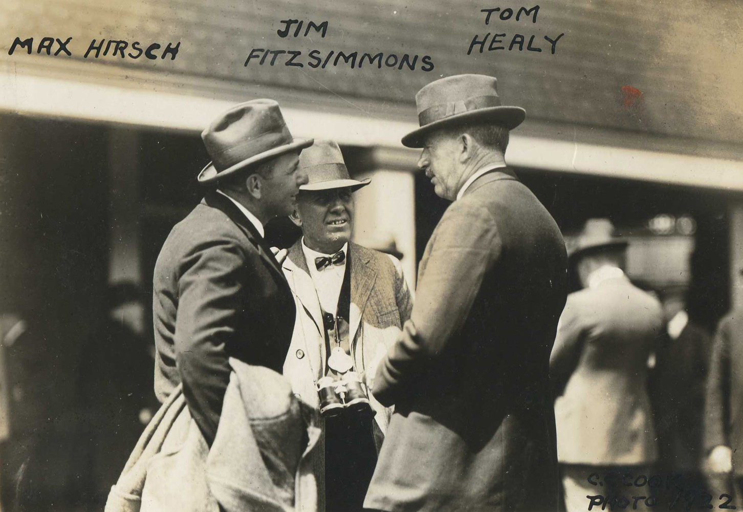 A young James "Sunny Jim" Fiitzsimmons (center) with fellow future Hall of Fame trainers Max Hirsch and T. J. Healey in 1922 (C. C. Cook/Museum Collection)