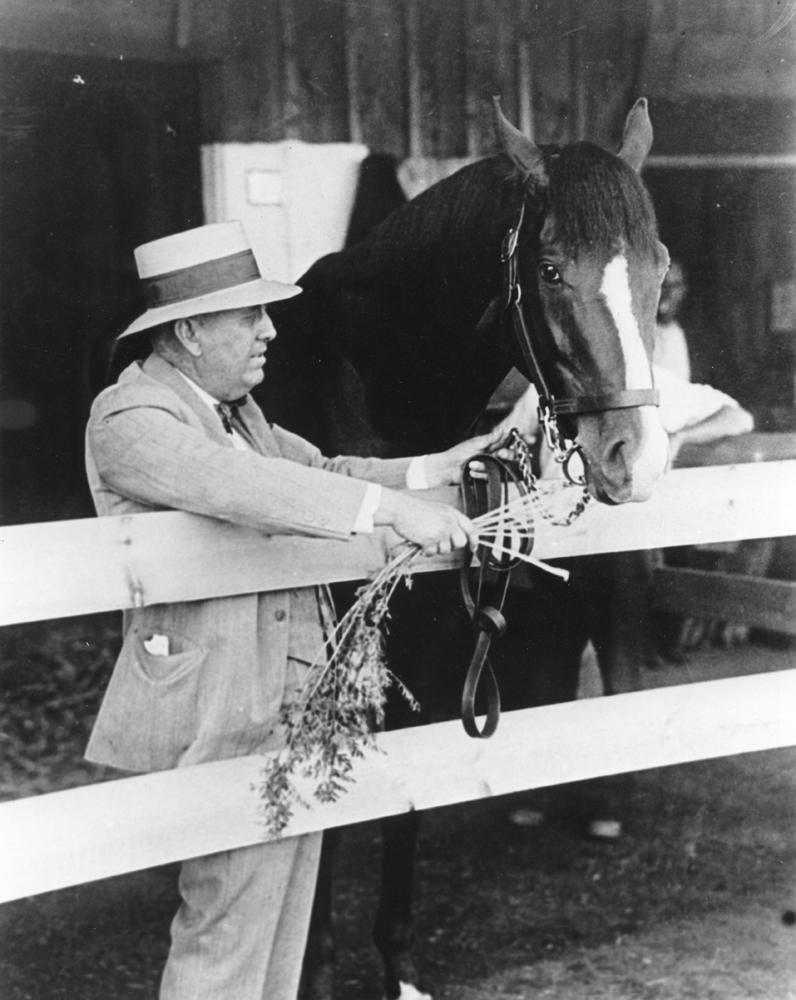 James "Sunny Jim" Fitzsimmons and Gallant Fox, his first Triple Crown winner, in 1930 (Museum Collection)