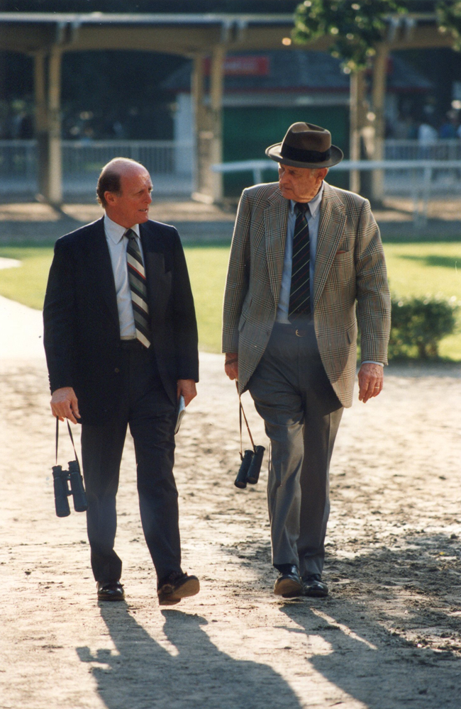 Hall of Fame trainers LeRoy Jolley and Mack Miller walking in the Belmont Park paddock in 1992 (Barbara D. Livingston/Museum Collection)